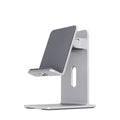 Alloy metal lazy bracket mobile phone holder on a desk, holding a smartphone.