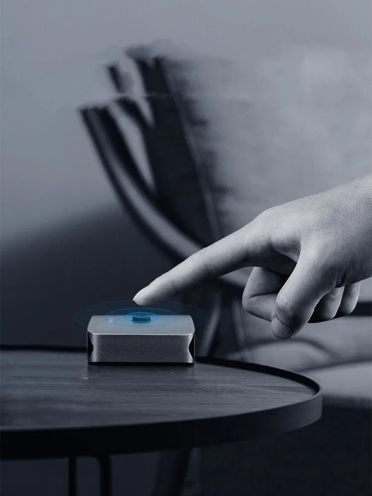 Grey Haibeisi HDMI switcher box showing one input and two output ports for splitting a video signal to two screens.