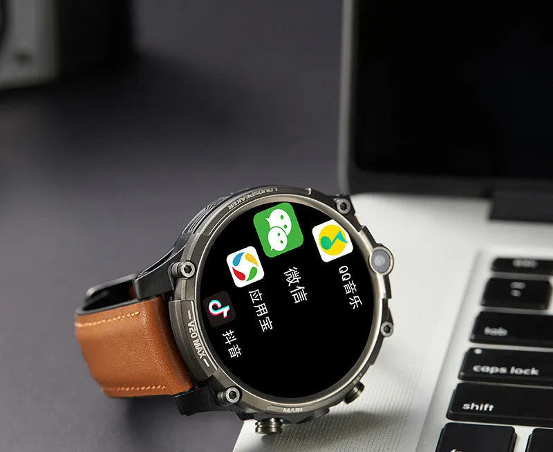 Black smart phone watch with 1.6-inch screen showing interface, wrist strap, and dual camera visible on case