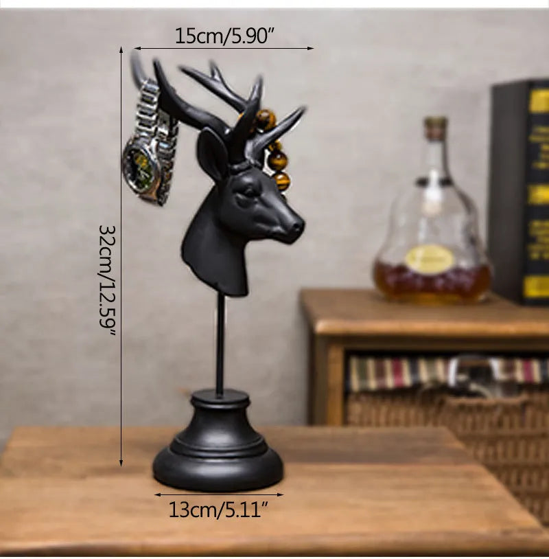 A tall black resin animal sculpture ornament for home decoration on a wooden surface.