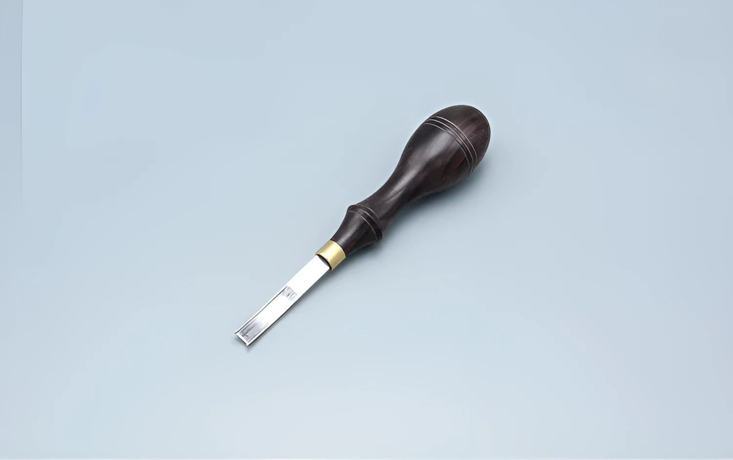Leather hand tools kit with sectional cutting knife and wide shovel edge thinner for skiving.