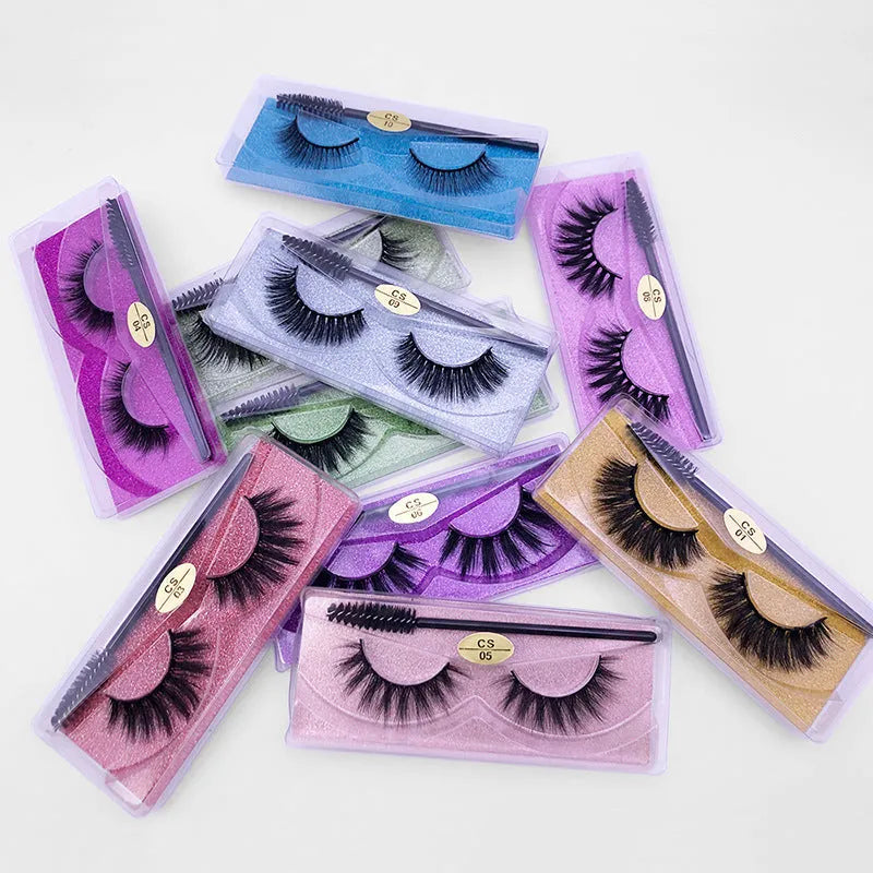 Pair of natural 3D false eyelashes with imitation mink fibres, plastic cotton thread stem, and included brush