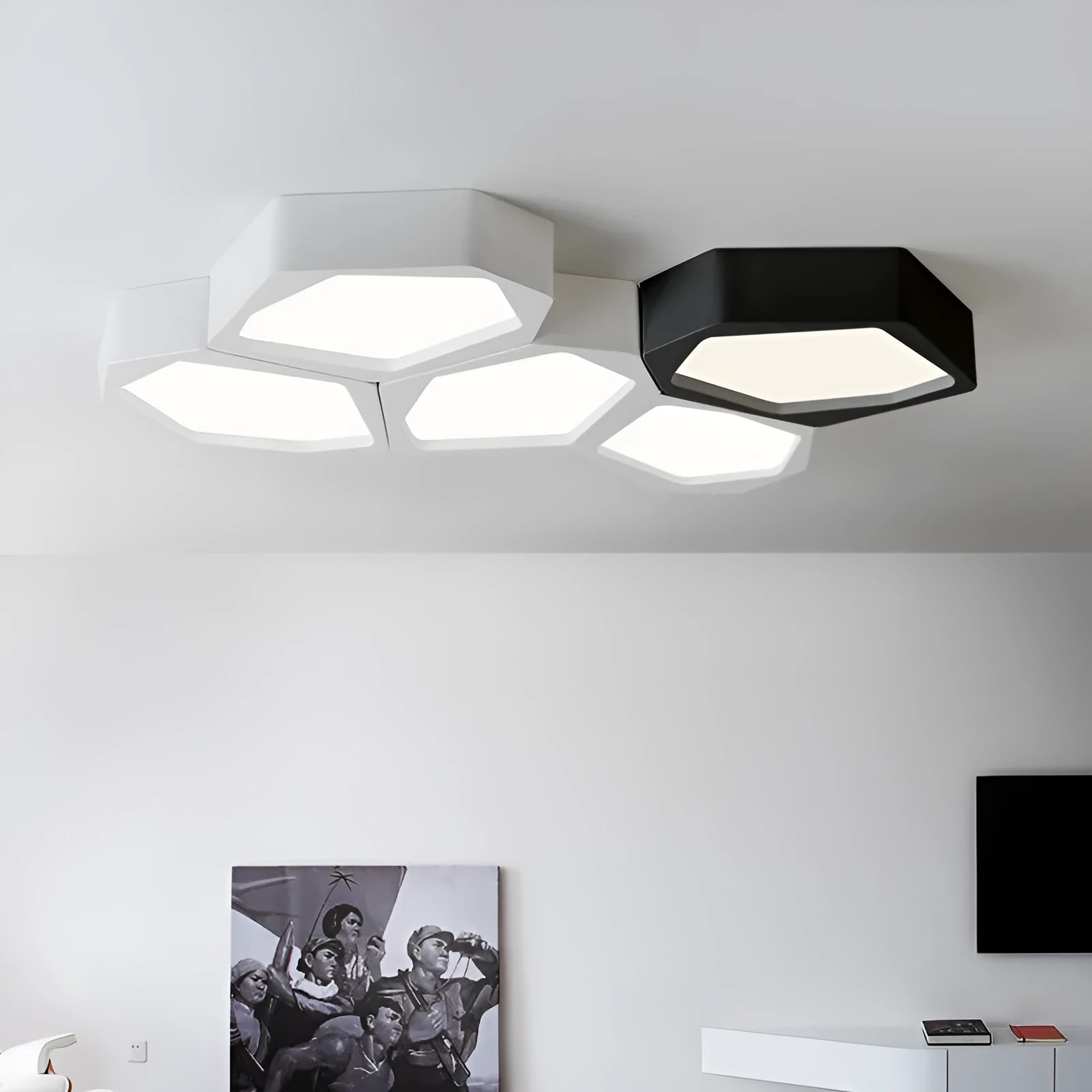 Geometric shaped LED wall or ceiling light in black or white iron frame with remote control.