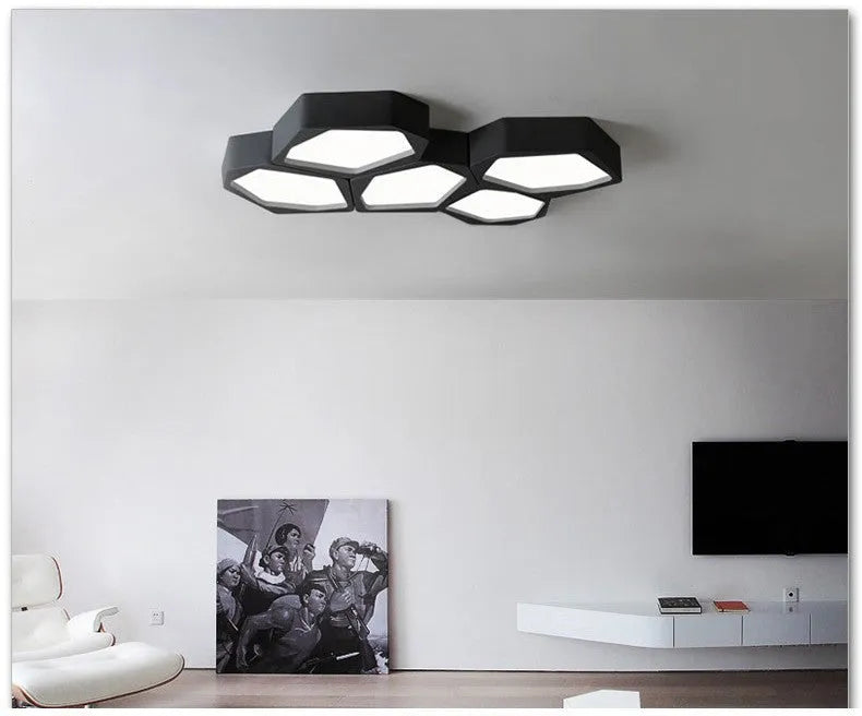 Geometric shaped LED wall or ceiling light in black or white iron frame with remote control.