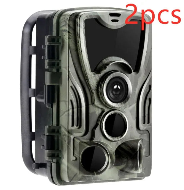 Green cellular trail hunting camera with night vision LEDs and mounting strap
