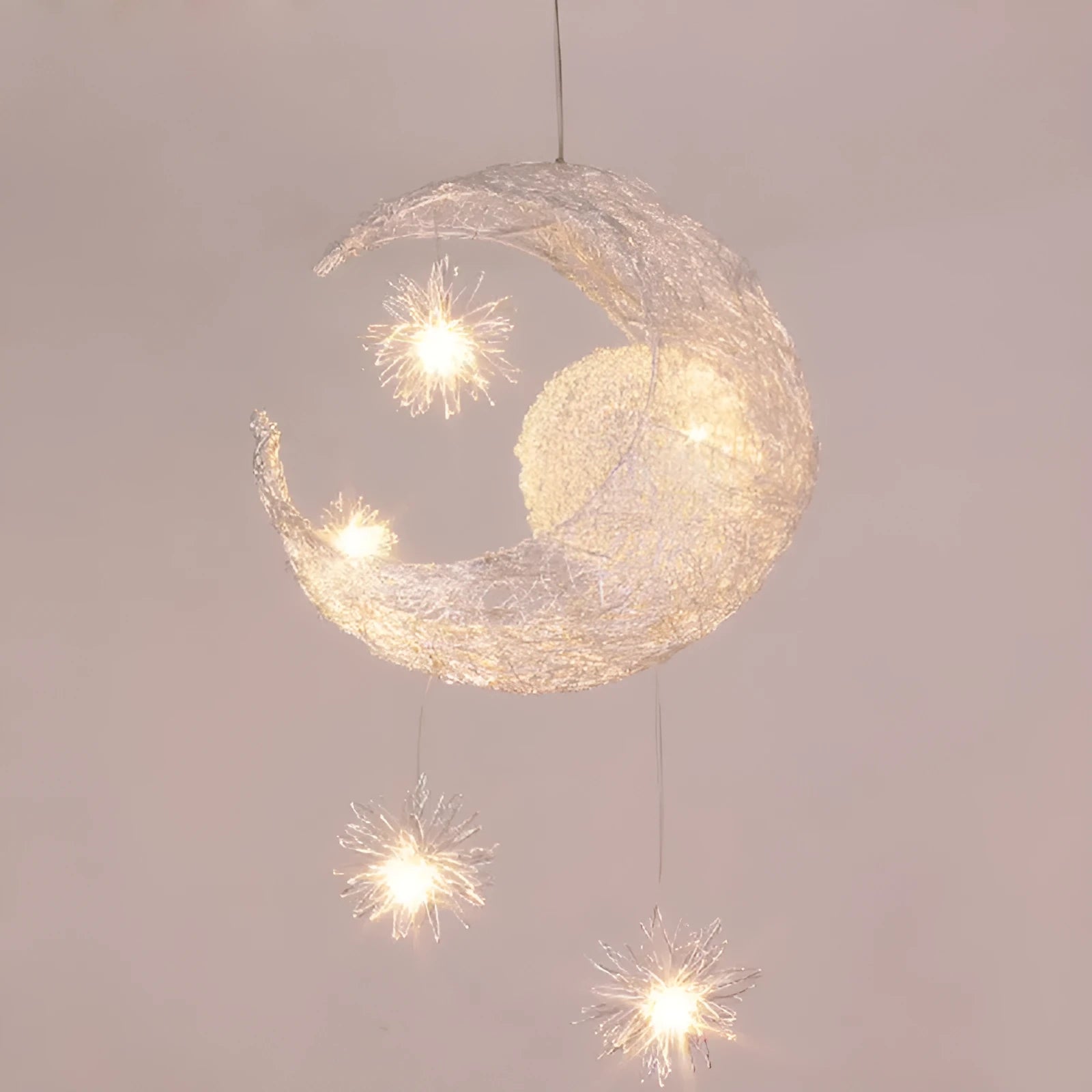 Aluminium wire star and moon design chandelier with adjustable hanging height.