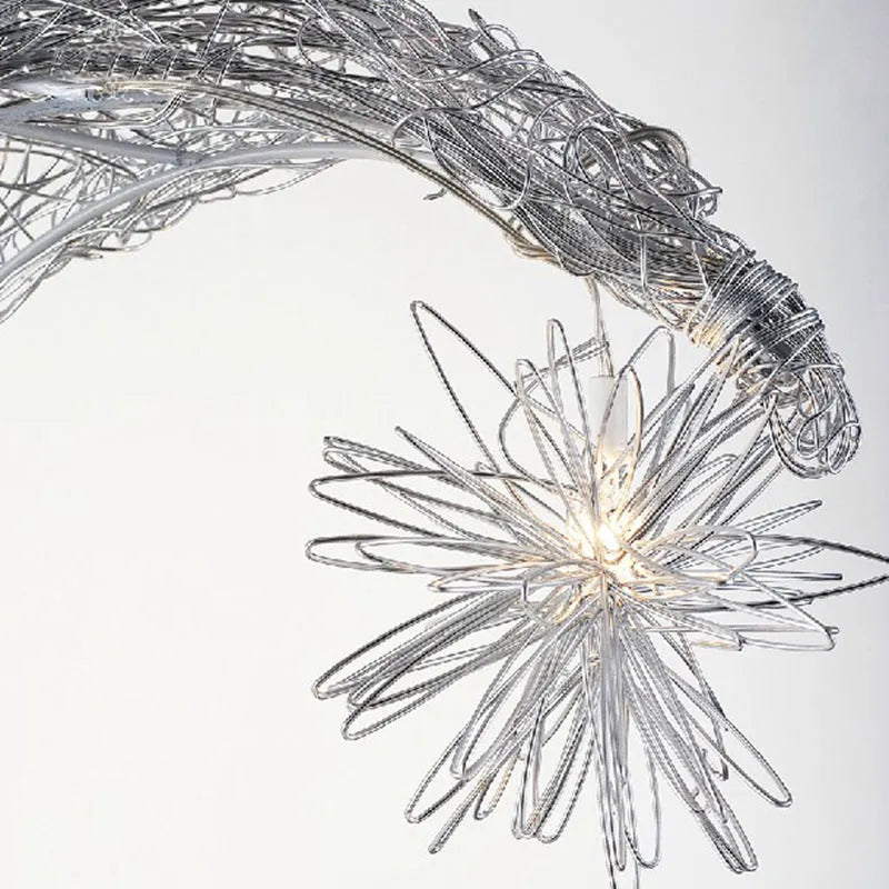 Aluminium wire star and moon design chandelier with adjustable hanging height.