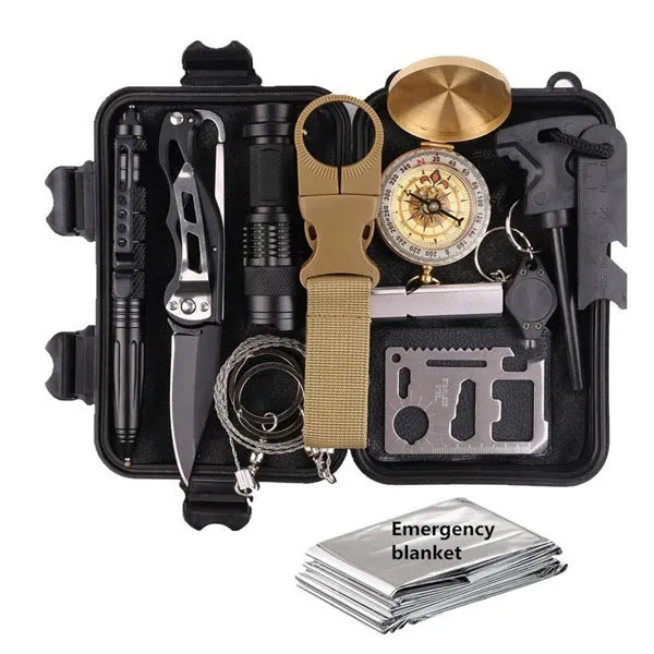 Black outdoor survival kit open to show compass, flashlight, wire saw, and tools inside a shockproof case.