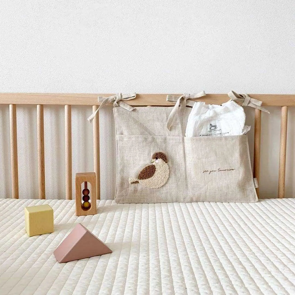 Khaki cotton linen hanging bedside storage bag with a single pocket.