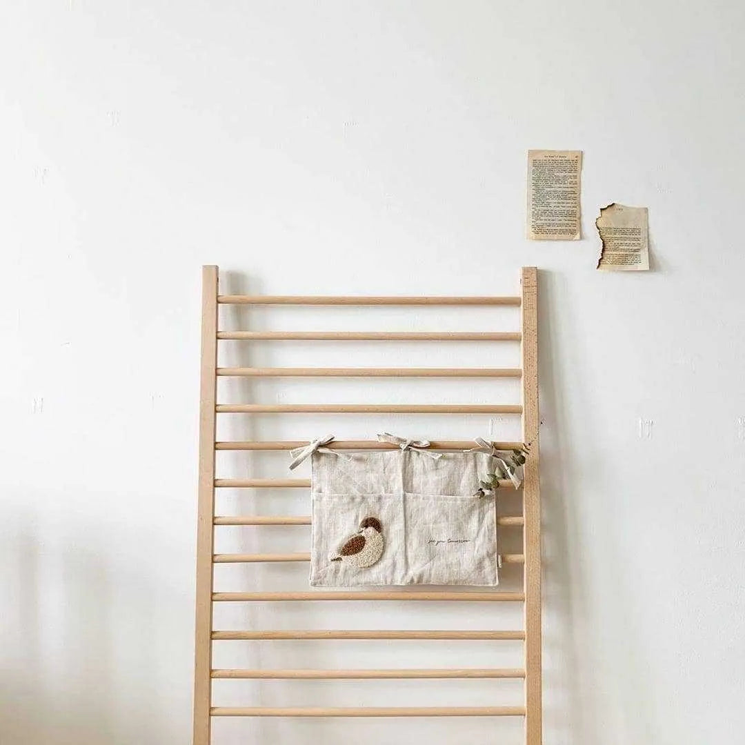 Khaki cotton linen hanging bedside storage bag with a single pocket.