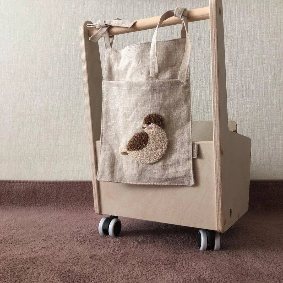 Khaki cotton linen hanging bedside storage bag with a single pocket.