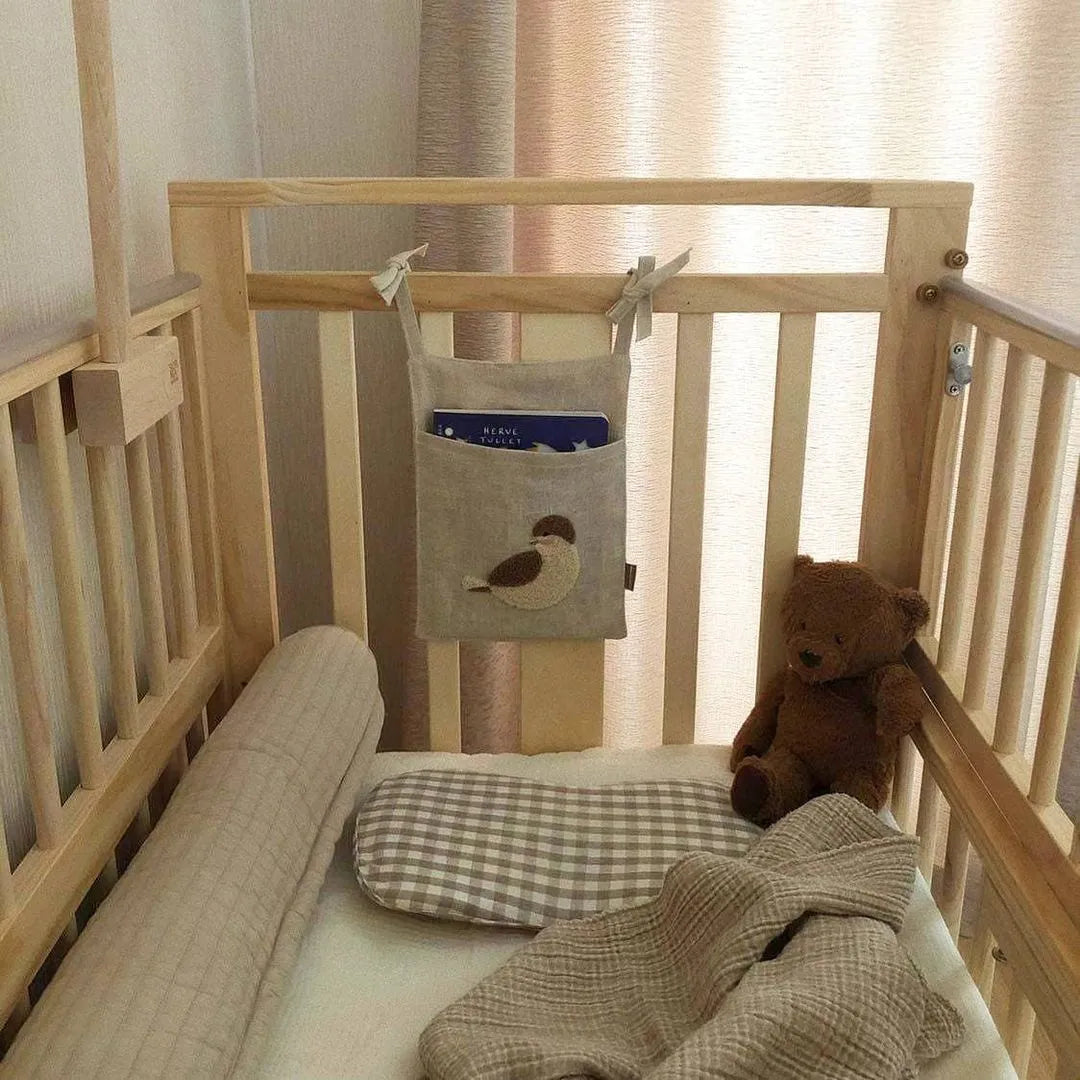 Khaki cotton linen hanging bedside storage bag with a single pocket.