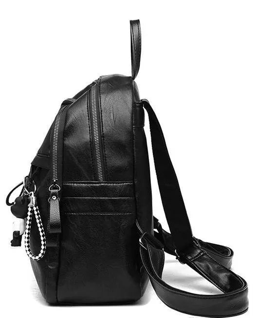Black soft pu leather backpack with double straps, shown open to reveal internal ID bag compartment.