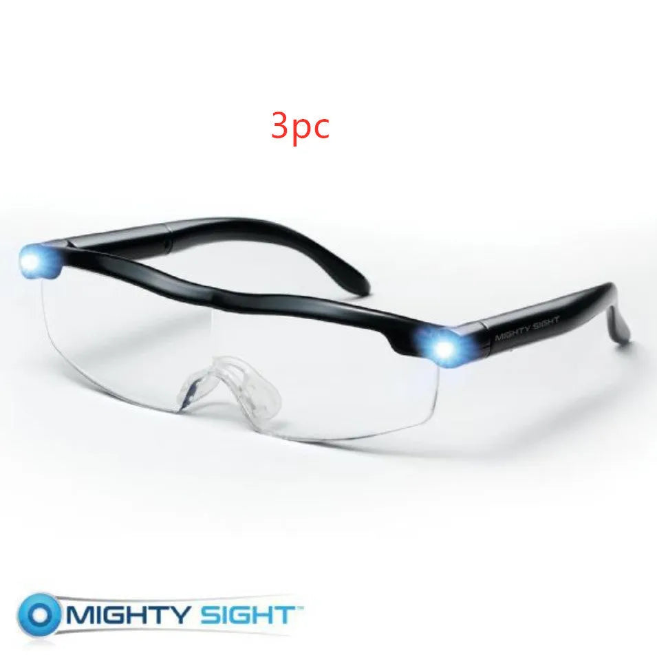 Transparent black USB LED reading glasses with built-in light on the frame.