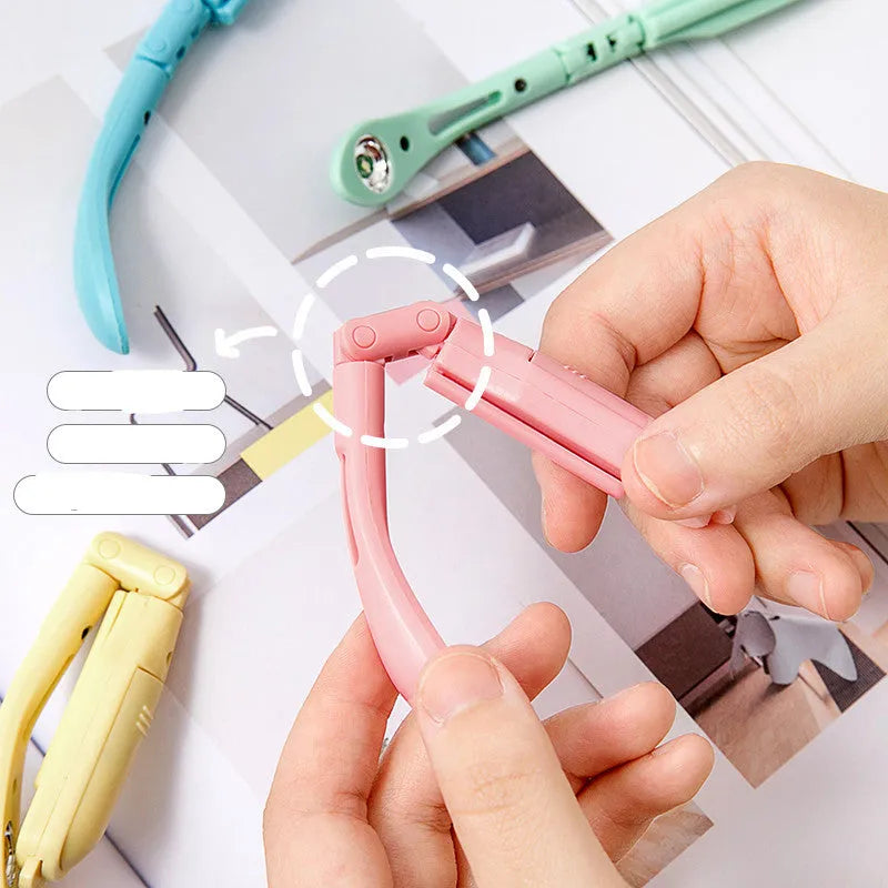 Folding book light in four colour options: yellow, green, blue, and pink with button switch control