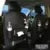 PU leather car storage hanging bag with multiple pockets attached to car seat