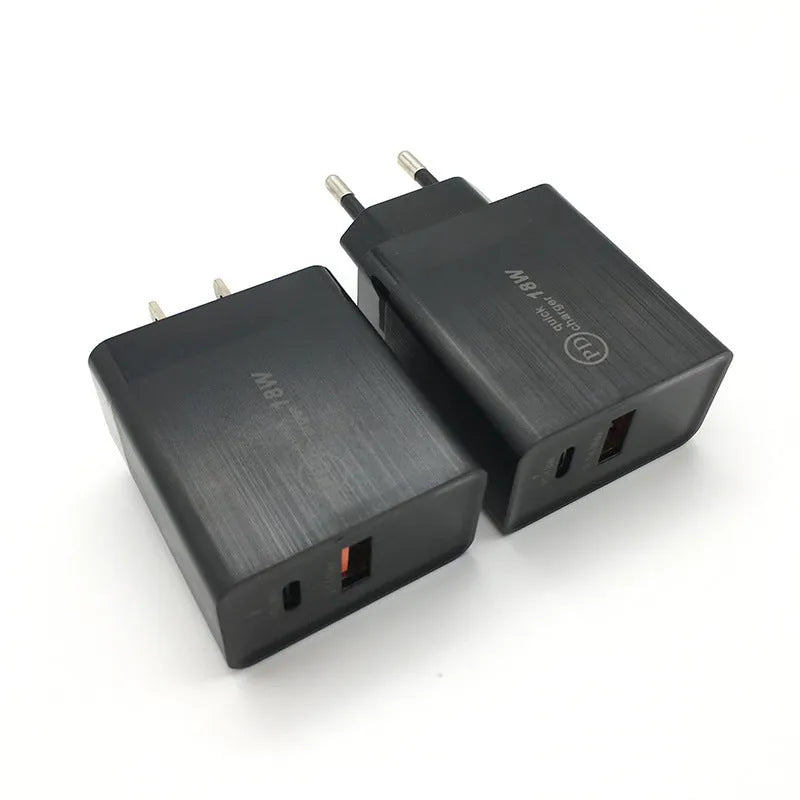Black and white 18W USB-C Power Delivery fast wall chargers with US and EU plugs.