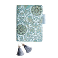 Flying Blue Flower fabric notebook in A5 and A6 sizes on a table.