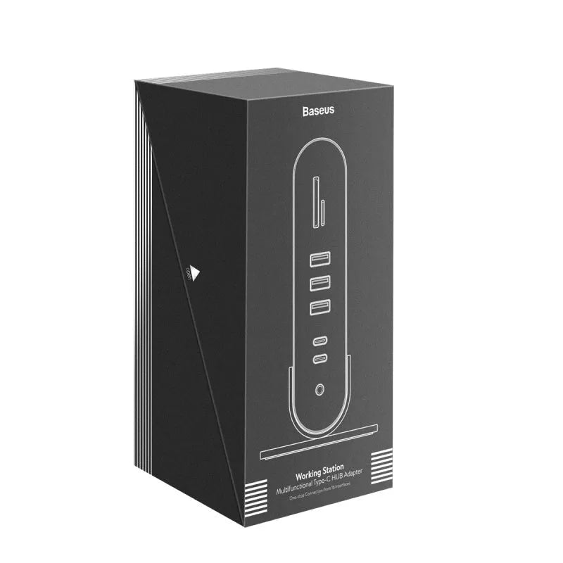 Deep space grey 16-in-1 USB-C laptop docking station with multiple ports on a desk.