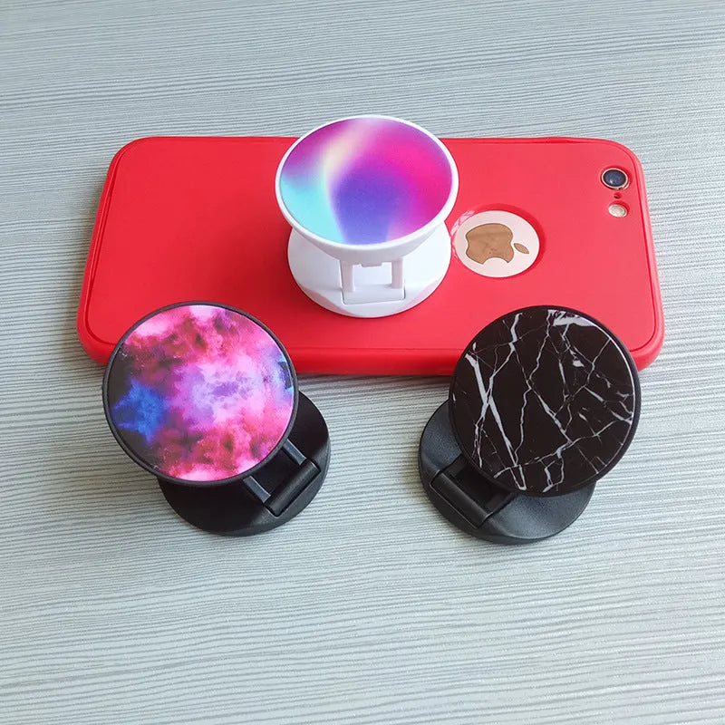 Folding mobile phone holder in solid colour with thermal transfer aluminium sheet option on desktop