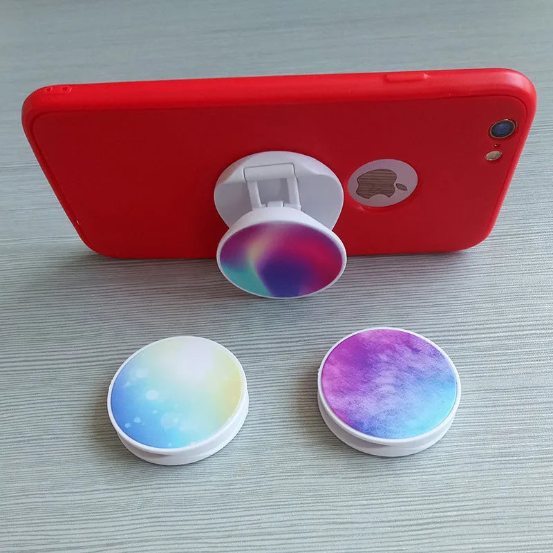 Folding mobile phone holder in solid colour with thermal transfer aluminium sheet option on desktop