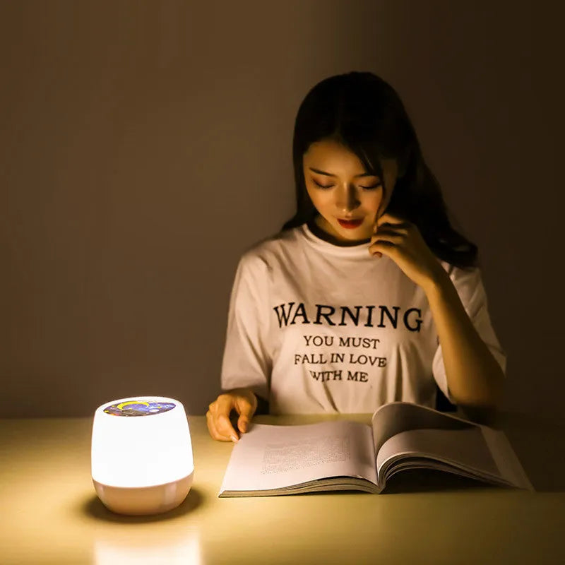 Pruixin rotating projector night light showing star patterns on a wall.