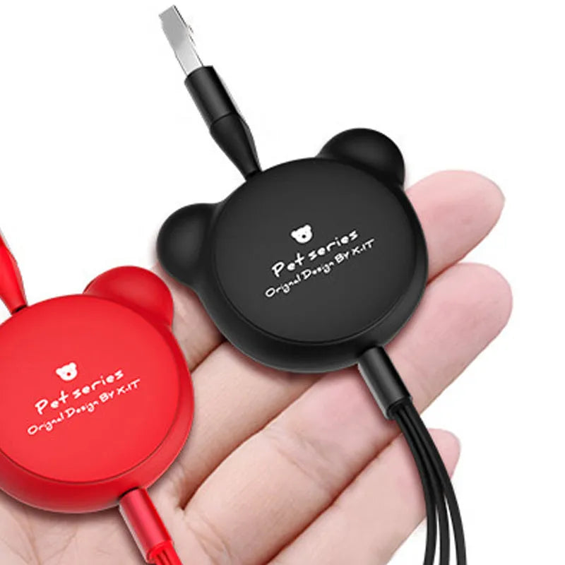 Cute bear-shaped cable organiser with three retractable data cables extended, showing Mini USB, Micro USB, and 30PIN connectors.