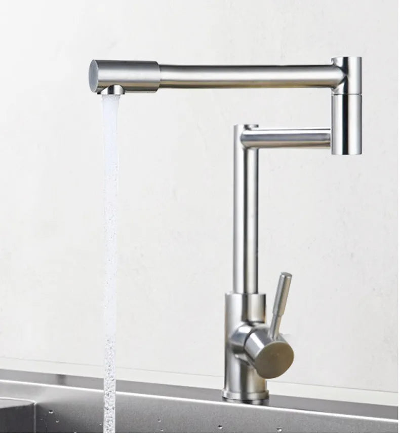 Stainless steel kitchen tap with rotating spout and dual hot and cold water controls