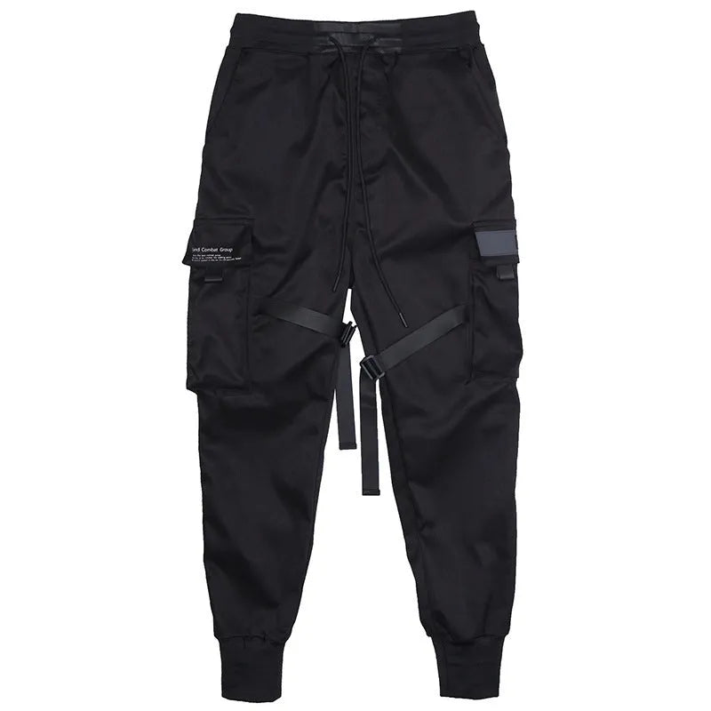 Black cotton cargo pants with tether closure, loose fit, ankle length, on a model
