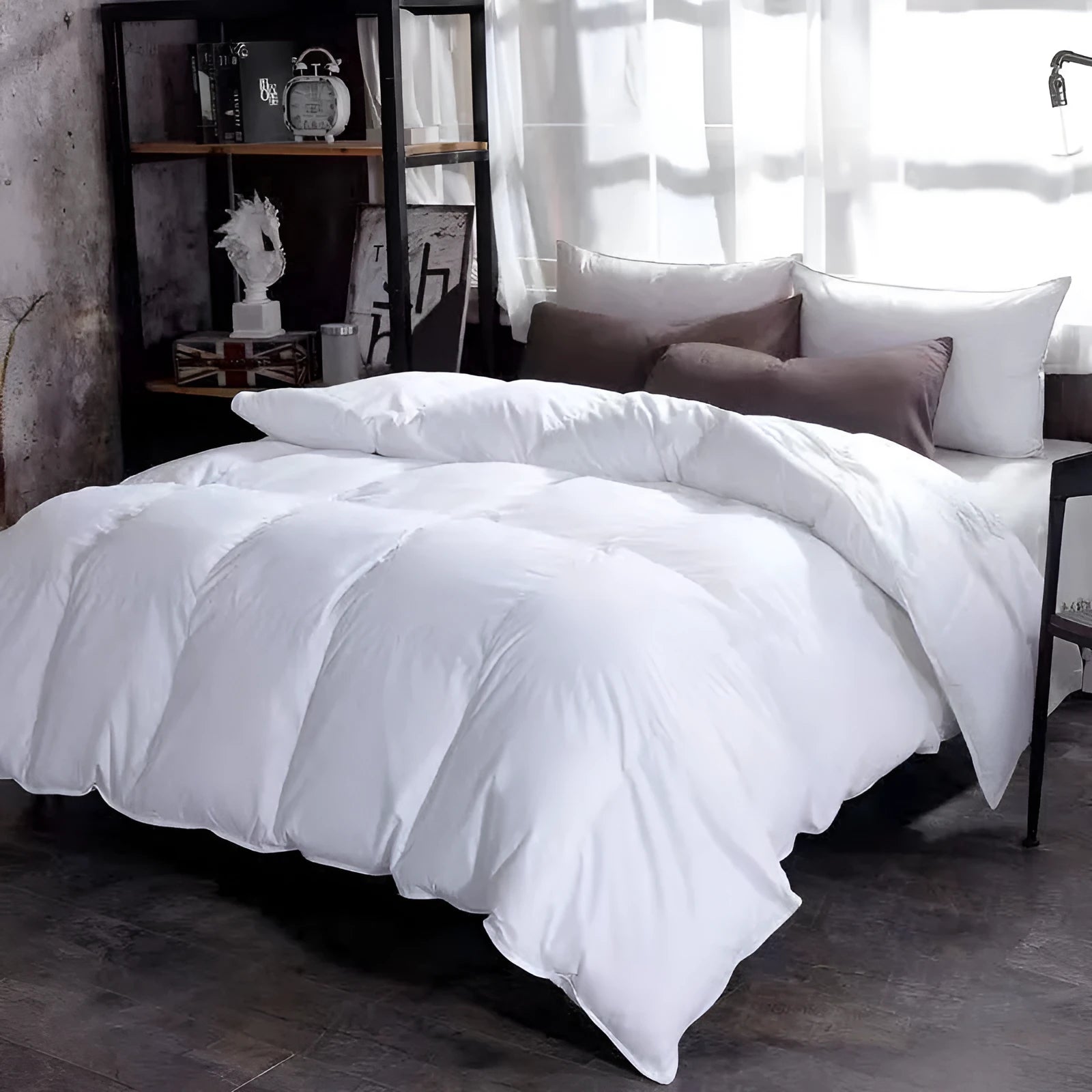 Goose down winter duvet in twill fabric shown in beige colour on a bed