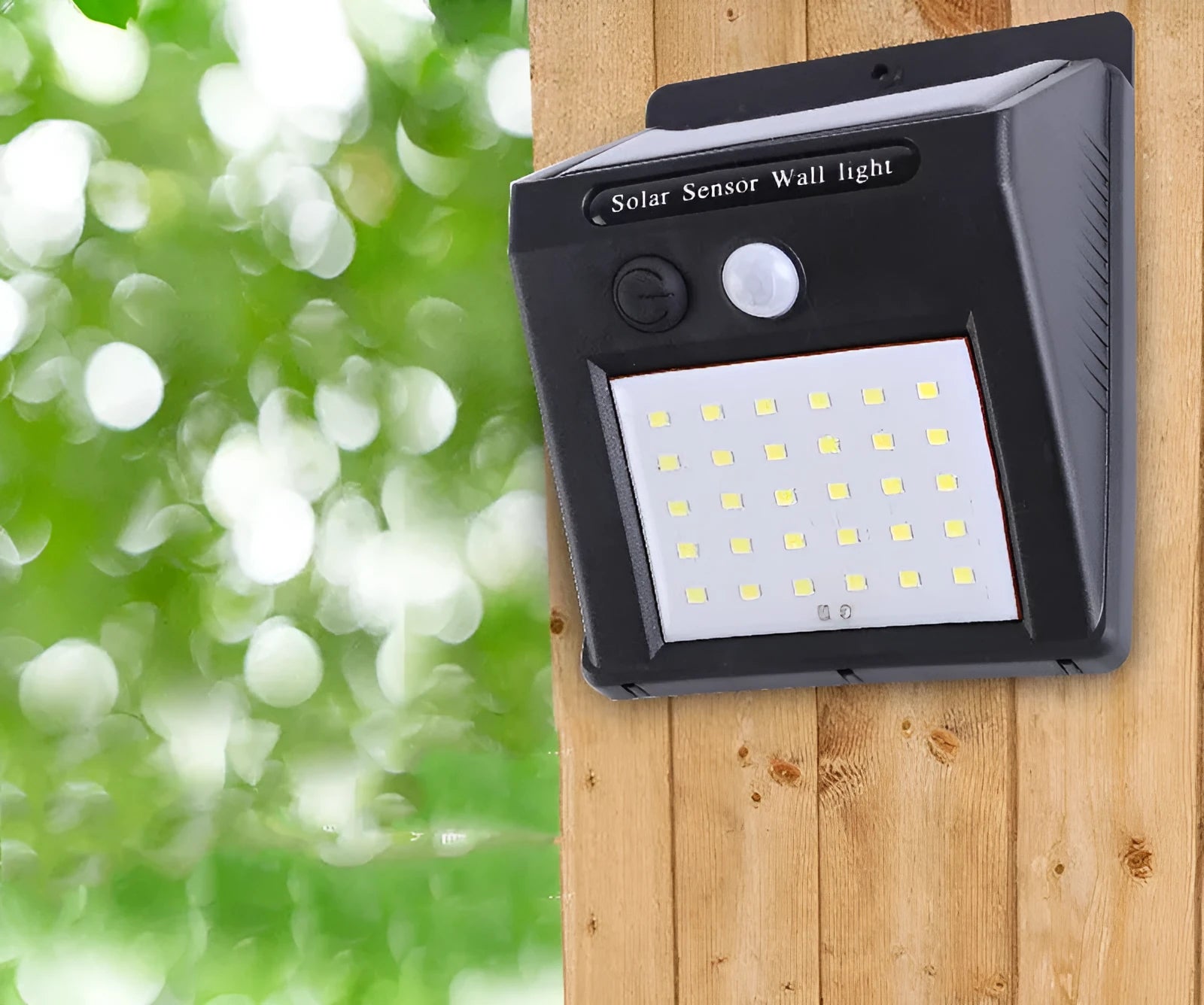 White solar-powered outdoor garden lamp with LED lights and a motion sensor on a black stake.