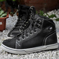 Men's black casual short motorcycle riding boots with a non-slip sole on a grey background.