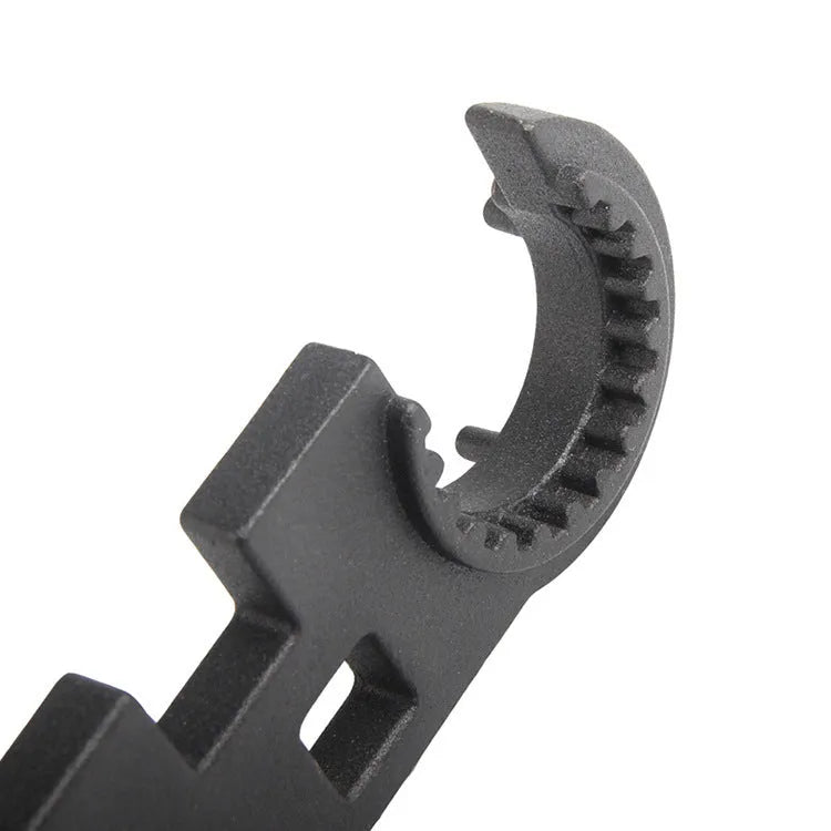 Black AR15 M4 combination wrench with dual-purpose design for firearm maintenance