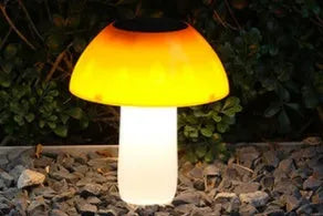 Solar mushroom garden light with ground spike for lawn installation