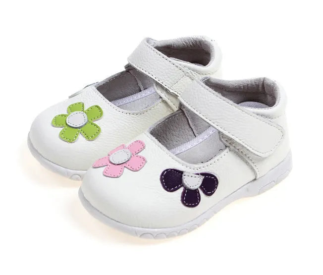 A pair of embroidered leather baby shoes with velcro fastening and a square toe, shown on a white background.