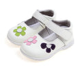 A pair of embroidered leather baby shoes with velcro fastening and a square toe, shown on a white background.