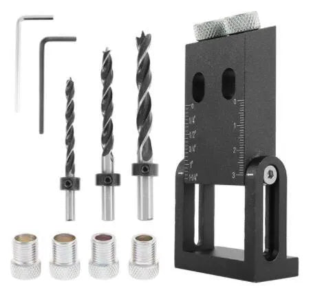 Black aluminium woodworking perforation locator tool with drill bits and sleeves for board connections.