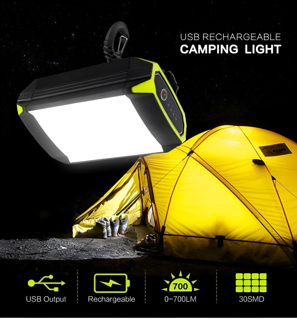 Green rechargeable camping light with USB port, measuring 130x90x47mm