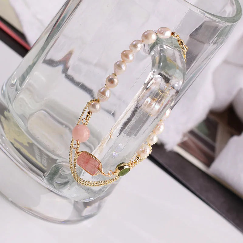 Women's pink freshwater pearl bracelet with geometric strawberry crystal charm