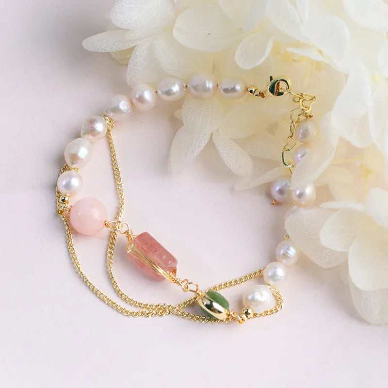 Women's pink freshwater pearl bracelet with geometric strawberry crystal charm