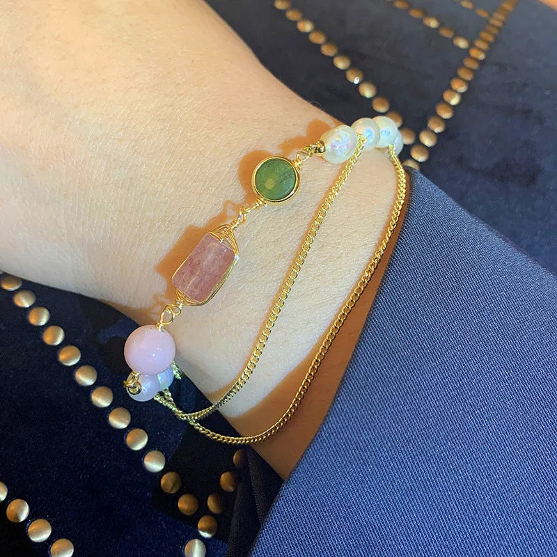 Women's pink freshwater pearl bracelet with geometric strawberry crystal charm