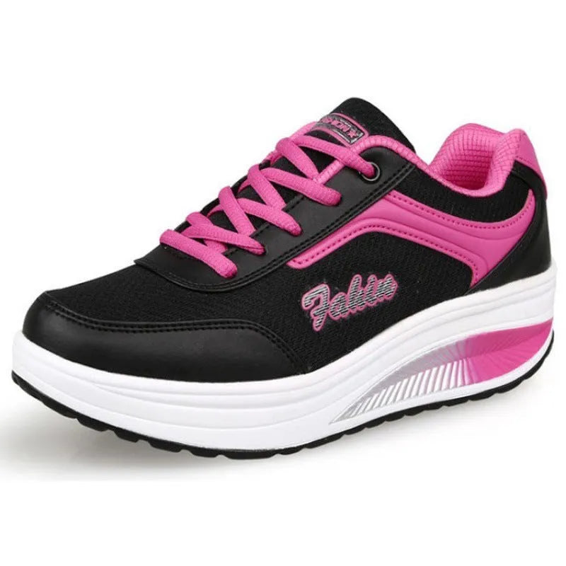 Women's mid-heel sports travel shoes in grey powder colour showing heelless design and single shoe construction