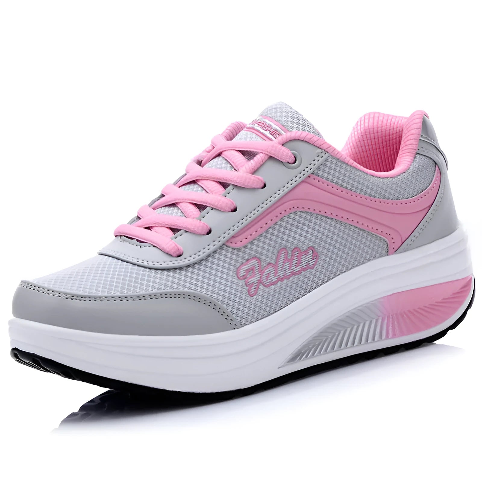 Women's mid-heel sports travel shoes in grey powder colour showing heelless design and single shoe construction