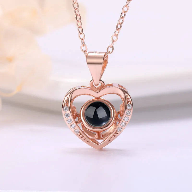 925 silver heart-shaped pendant necklace on cross chain with geometric detail and adjustable length