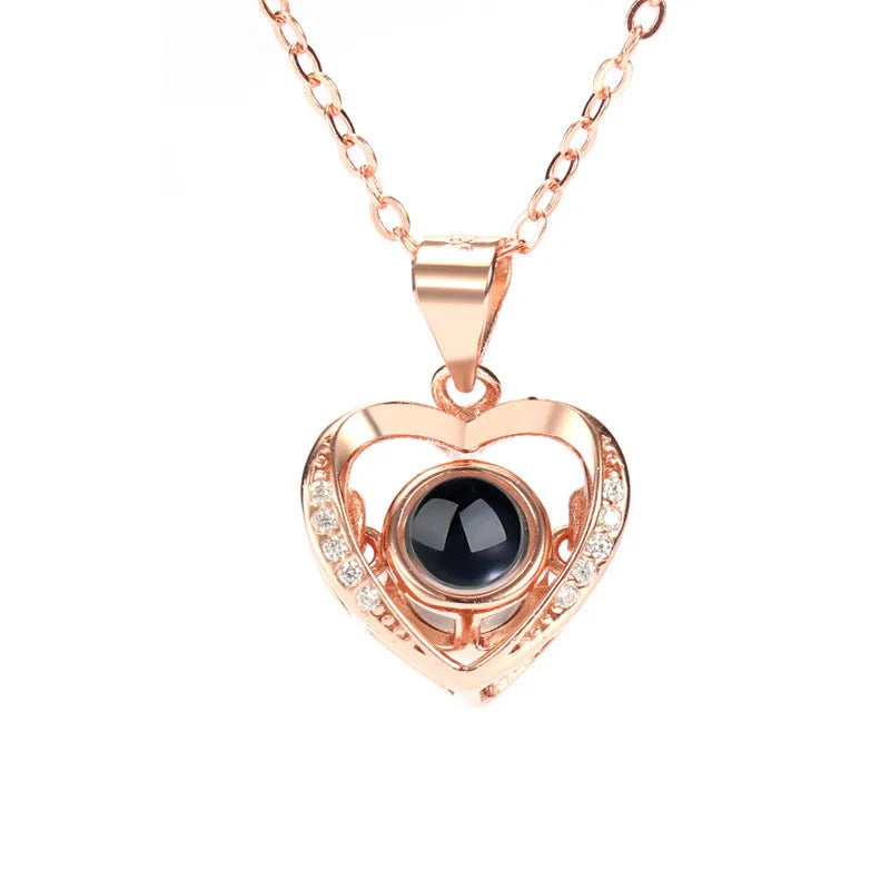 925 silver heart-shaped pendant necklace on cross chain with geometric detail and adjustable length