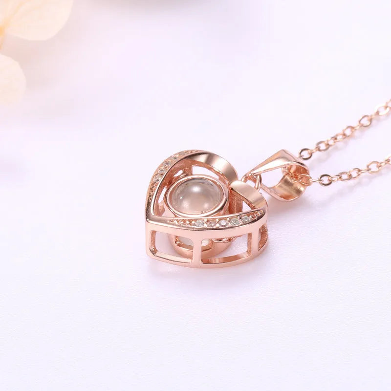 925 silver heart-shaped pendant necklace on cross chain with geometric detail and adjustable length