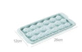 Sky blue round ball ice cube mould with 18 spherical cavities on a kitchen counter