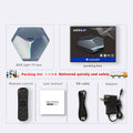 Android TV set-top box media player with remote control on a wooden surface.