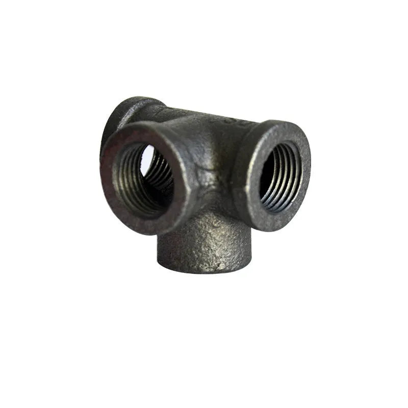 Galvanised steel four-way pipe fitting with three-dimensional corner design for industrial plumbing connections