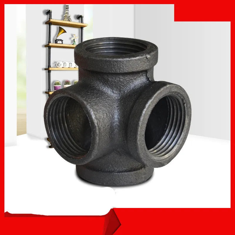 Galvanised steel four-way pipe fitting with three-dimensional corner design for industrial plumbing connections